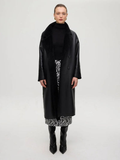 abrigo de ecopiel negro de Mioh 
