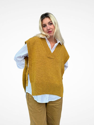 chaleco de punto mostaza oversized 