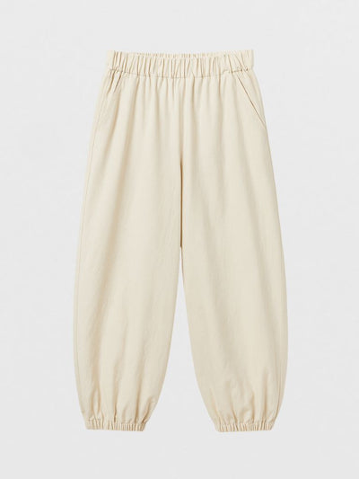Pantalón bombacho de color beige